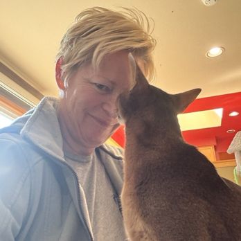 Reining Cats And Dogs - Sherman giving Kirsten nose kisses  We love the bond she has with our cats! - Pet Sitting Near Me