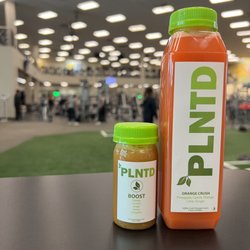 PLNTD Juice - Ultimate immune boosting duo! "Orange Crush" cold pressed juice with orange, pineapple, carrot, lime, and ginger paired with "BOOST" shot!