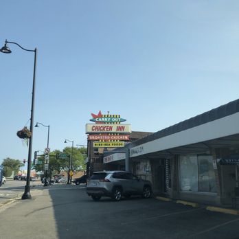 Chicken Inn - Their strip mall and their catchy, historic signage. - Chicken Wings Near Me - Chicago, Illinois Chicken Inn - Their strip mall and their catchy, historic signage. - Chicken Wings Near Me - Chicago, Illinois