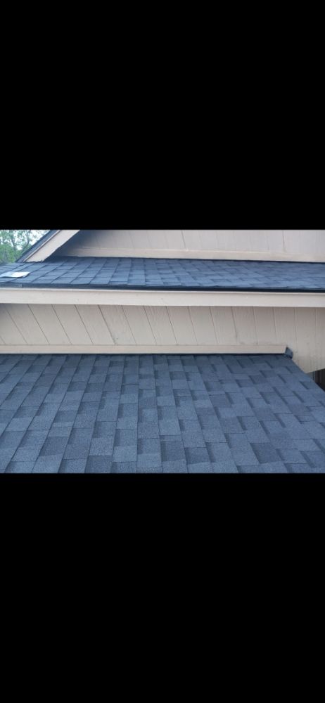 Slide of Macaw Roofing