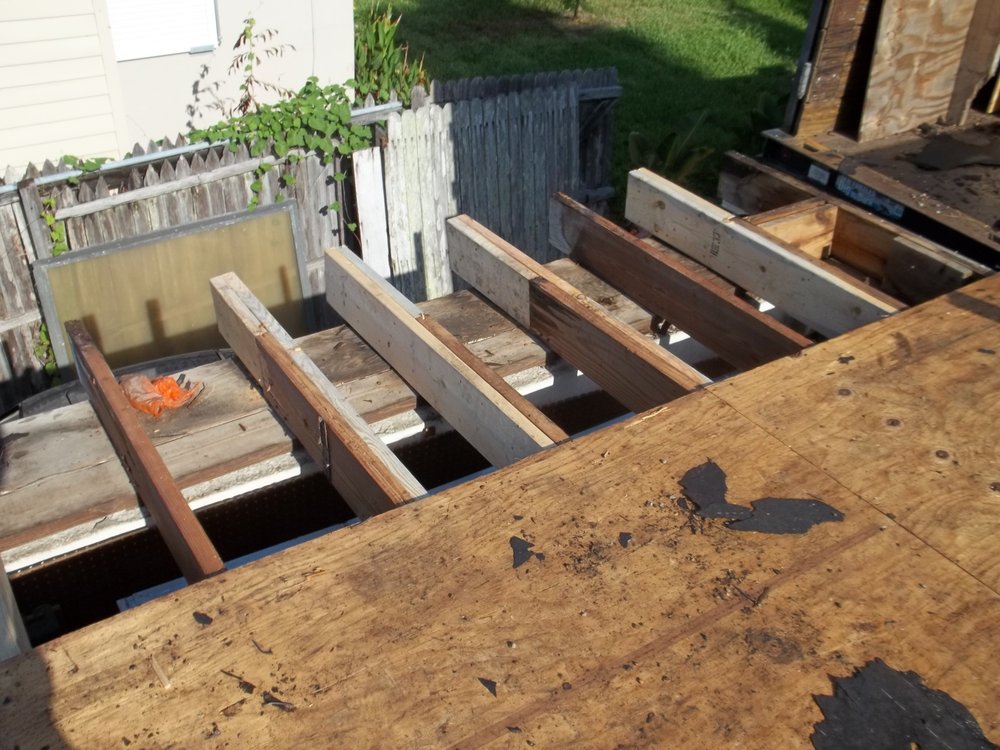 Slide of J K Behan Roofing