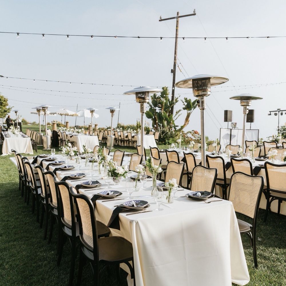 Rustic Yard Events - Banquet long tables with ivory linens, dinning chairs, heaters, and lighting - Party Equipment Rentals Near Me - Pacoima, California Rustic Yard Events - Banquet long tables with ivory linens, dinning chairs, heaters, and lighting - Party Equipment Rentals Near Me - Pacoima, California