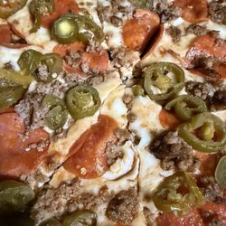 Uncooked cheese and toppings.