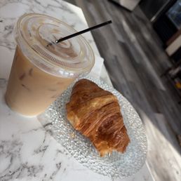 Iced coffee and croissant