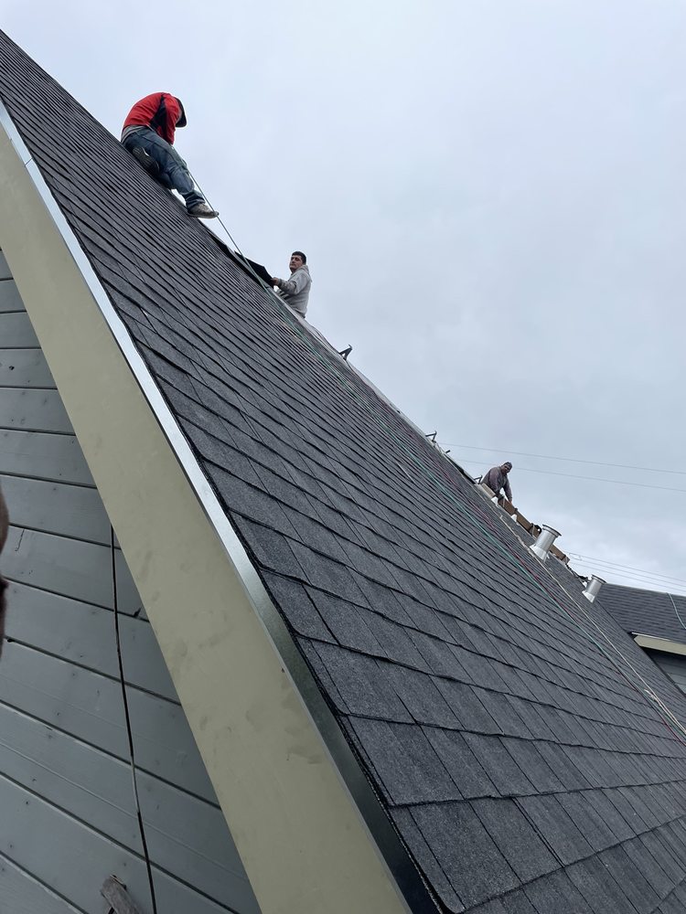 Slide of Al Jr's Roofing