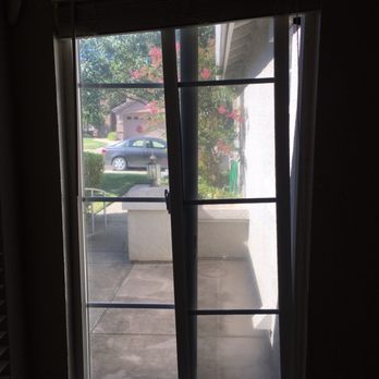 Eagle's Eye Cleaning - Window left unlocked and jacked up and crooked and almost broken - Home Cleaning Near Me