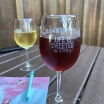 Duplin Winery - a glass of wine and a book - Wine Tasting Room Near Me - N Myrtle Beach, South Carolina