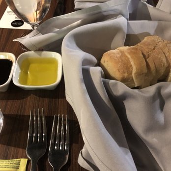 Loveria Caffè Taste Of Italy - Bread basket with oil and vinegar - Italian Near Me - Colleyville, Texas Loveria Caffè Taste Of Italy - Bread basket with oil and vinegar - Italian Near Me - Colleyville, Texas
