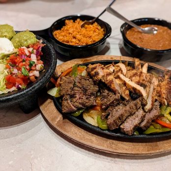 Chuy's - Fajitas combo with beef and chicken. - Mexican Near Me - Dallas, Texas Chuy's - Fajitas combo with beef and chicken. - Mexican Near Me - Dallas, Texas