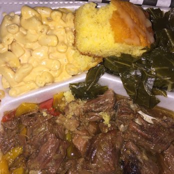 The Rolling Rooster - Overpriced Oxtails (w/o rice) w yummy greens and Mac & cheese. Comes w cornbread. Added on side shrimp, fish and wing - Chicken Wings Near Me - Austin, Texas The Rolling Rooster - Overpriced Oxtails (w/o rice) w yummy greens and Mac & cheese. Comes w cornbread. Added on side shrimp, fish and wing - Chicken Wings Near Me - Austin, Texas