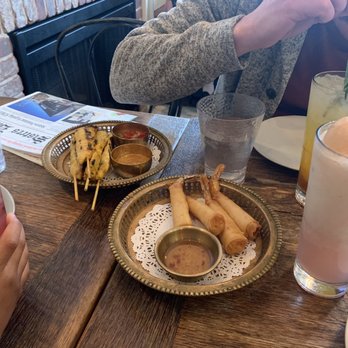 Sisters Thai - Pomegranate, ginger and lychee drinks with bikini shrimp and chicken satay. - Thai Near Me - Potomac, Maryland