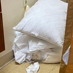 Avir Health Group - Soiled bedding and used wipes just laying on the floor for hours in a room.