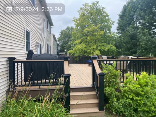 Timber Tech Deck - We removed the pressure treated wood on this deck and went back with a Timber Tech re surface with a Timber Tech black railing. As a SWEET final touch we added lighting to all the posts! One of my favorites and it only took 3 days to complete!