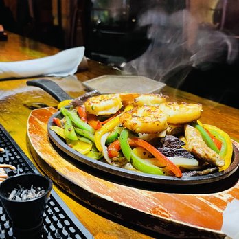 Los Dos Hermanos - a plate of food on a table - Tapas Bars Near Me - Brooklyn, New York