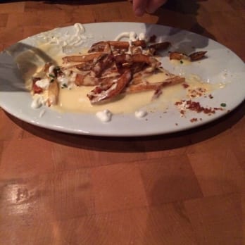 Zinburger - Loaded fries .....half eaten as we could not wait. Excellent !! - Burgers Near Me - Tucson, Arizona
