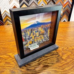 Frame of Mind - Save money with this custom money box with an interchangeable background