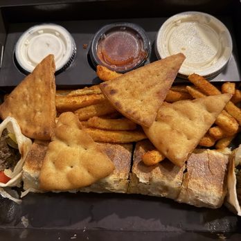 Habibi's Shawarma - Beef Shawarma with fries and hummus. - Mediterranean Near Me - Little Rock, Arkansas Habibi's Shawarma - Beef Shawarma with fries and hummus. - Mediterranean Near Me - Little Rock, Arkansas