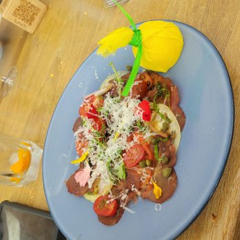 The Strand at Carillon Miami - Mike's Heirloom Tomato and Spotted Trotter Bresaola Carpaccio - Seafood Near Me - Miami Beach, Florida
