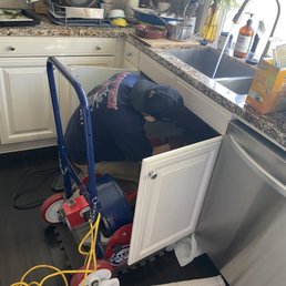 Chris snaking our kitchen line.