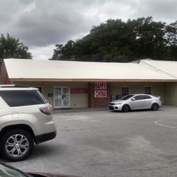 Happy China Restaurant - The building is located in the center with a Dollar store.