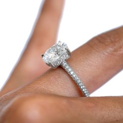 Designs By Kamni - 2.5ct Oval Moissanite in a tri-pave diamond encrusted setting