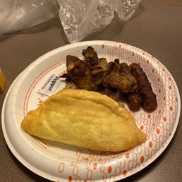 Breakfast omelette, potatoes, and sausage. Breakfast omelette, potatoes, and sausage.