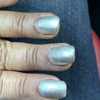 Natural Nails Spa - Polish spread all over my cuticle and soo bumpy, ugly shape uggh - Nail Salons Near Me - Long Beach, California