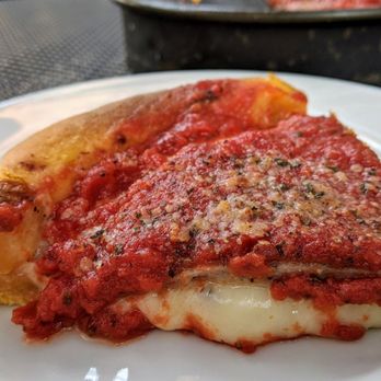 Gino's East - South Loop - Gino's East South Loop 09-07-2020: 9" Deep Dish Pizza - Tomato Sauce, Mozzarella Cheese, Sausage Patty - Pizza Near Me - Chicago, Illinois Gino's East - South Loop - Gino's East South Loop 09-07-2020: 9" Deep Dish Pizza - Tomato Sauce, Mozzarella Cheese, Sausage Patty - Pizza Near Me - Chicago, Illinois