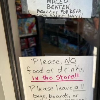 Astro-Zombies - Signage about solicitors, food, drinks, and bags posted outside. - Toy Stores Near Me - Albuquerque, New Mexico