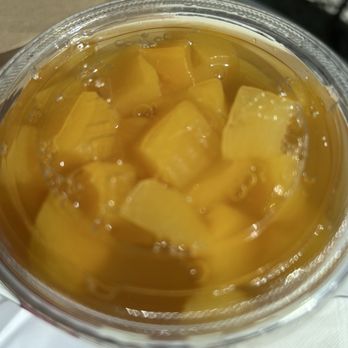 Banh Mi Oven - Mango tea. The lid doesn't have a straw hole. Not that I could see. - Vietnamese Near Me - Austin, Texas