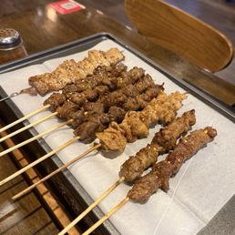 Pork belly, beef, chicken skin, lamb (left to right) Pork belly, beef, chicken skin, lamb (left to right)