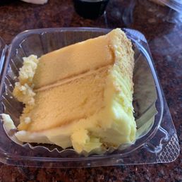 Lemon meringue cake. Not sure where the meringue comes in. It was lemon cake with lemon frosting. Pretty good. Lemon meringue cake. Not sure where the meringue comes in. It was lemon cake with lemon frosting. Pretty good.