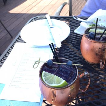 Bleuroot - Garden mule. The bartender likes to make it look like a smiley face. DELICIOUS! - New American Near Me - West Dundee, Illinois