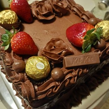 Debs Pies - Chocolate drizzle cake with strawberrys and candy accessories - Bakeries Near Me - Enid, Oklahoma Debs Pies - Chocolate drizzle cake with strawberrys and candy accessories - Bakeries Near Me - Enid, Oklahoma