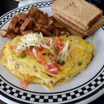 Grump's Cafe - Crofton - The Spanish Omelette with a side of potatoes - Breakfast & Brunch Near Me - Gambrills, Maryland Grump's Cafe - Crofton - The Spanish Omelette with a side of potatoes - Breakfast & Brunch Near Me - Gambrills, Maryland