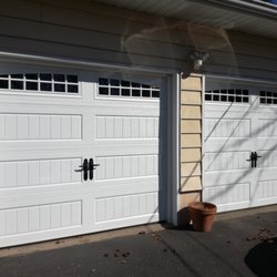 Michael's Garage Doors - new doors with arch windows and alpine handels