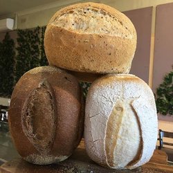 Ausvi Bakery - Dark Rye, Sour Dough, and Multigrain bread. Image credit: Aus Vi Bakery