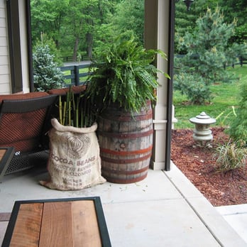 Scott's Landscaping - a patio with a table and chairs - Landscaping Near Me - Louisville, Kentucky Scott's Landscaping - a patio with a table and chairs - Landscaping Near Me - Louisville, Kentucky