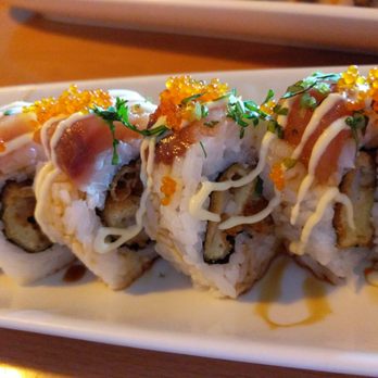Sushi Hub - Happy Belly Roll. Asparagus, tempura, shrimp tempura, albacore tuna, tobiko, cilantro & special sauce. - Sushi Bars Near Me - Stockton, California Sushi Hub - Happy Belly Roll. Asparagus, tempura, shrimp tempura, albacore tuna, tobiko, cilantro & special sauce. - Sushi Bars Near Me - Stockton, California