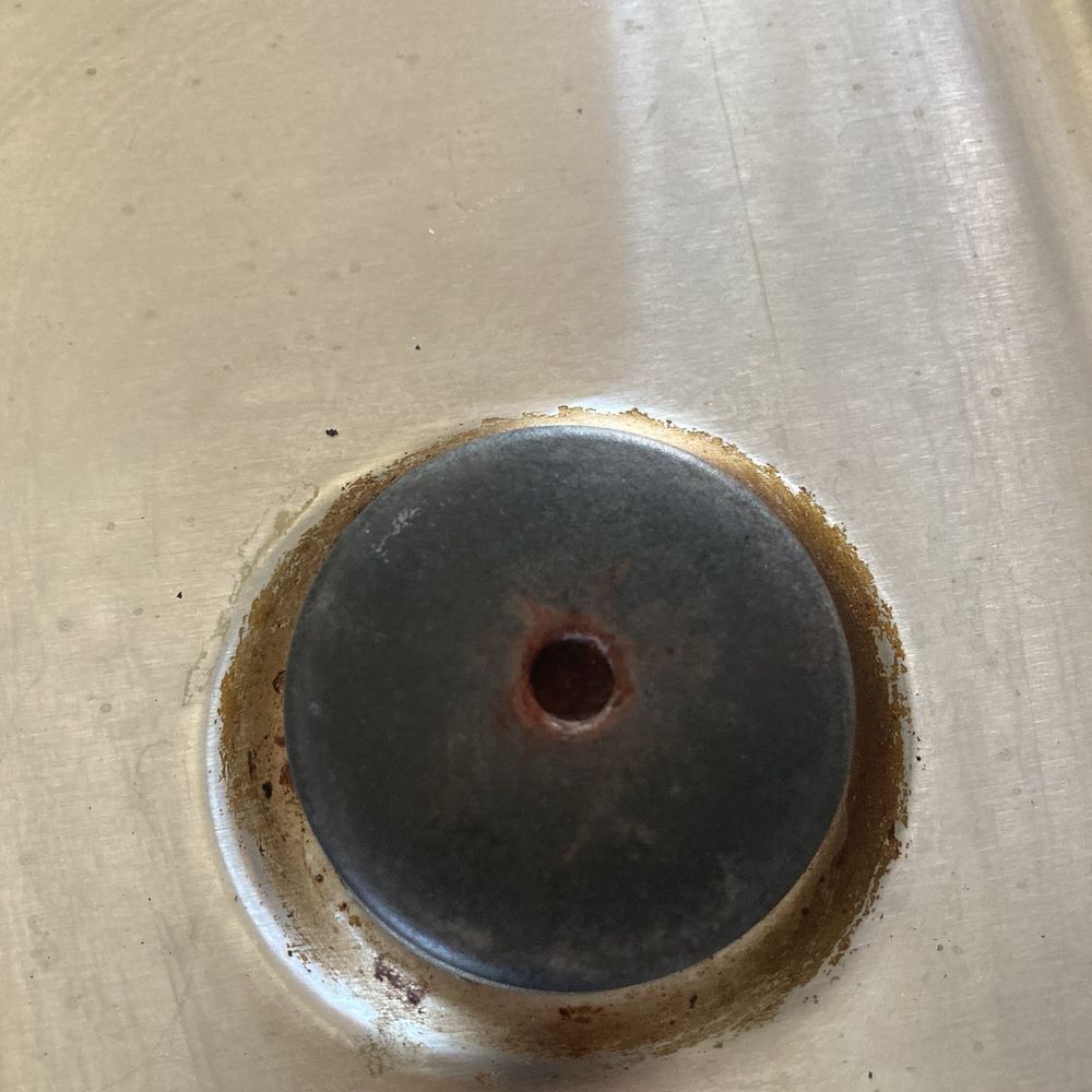 Ester's Cleaners - Before - rusty caked on burner - Home Cleaning Near Me