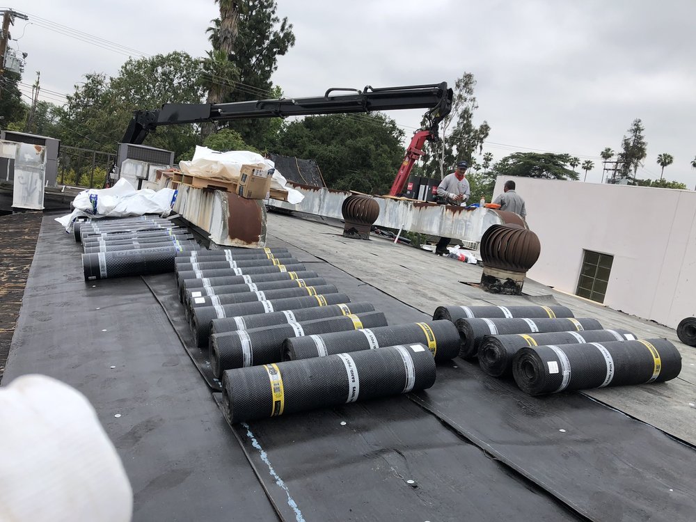 Slide of J P Roofing