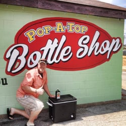 Pop-A-Top Bottle Shop - Posing for a picture in front of THE Great Wall of Pop A Top
