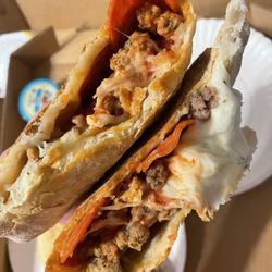 Dario's Pizza and Calzones - Calzone halves: meat lovers and house