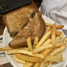 a sandwich and fries on a plate a sandwich and fries on a plate