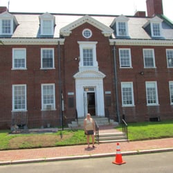 Quabbin Visitor Center - Scruffy person standing in front of visitor center