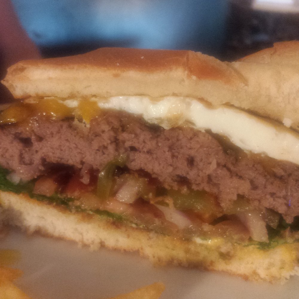 Black Oak Grill - The Ozark Burger has an egg on it - American Near Me - Branson, Missouri