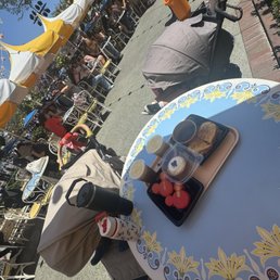 Mickey macaroons, blueberry cheesecake, birria grilled cheese, and lemon iced tea absolutely stunning meal