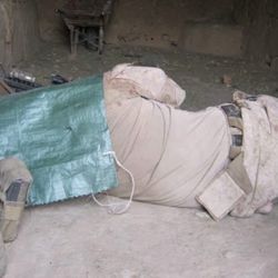 Grace House Prayer and Counseling Center - Sleeping in cattle barn, sand bag is for building security. Also keeps 1,000 flys off your face.
