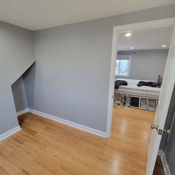MeyMax Construction - a view of a bedroom from the hallway - General Contractors Near Me - Belleville, New Jersey