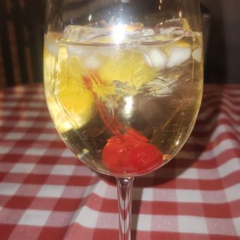 Grimaldi's Pizzeria - House white sangria- Lolailo white sangria l served over ice with diced apples & peaches - Pizza Near Me - Scottsdale, Arizona Grimaldi's Pizzeria - House white sangria- Lolailo white sangria l served over ice with diced apples & peaches - Pizza Near Me - Scottsdale, Arizona